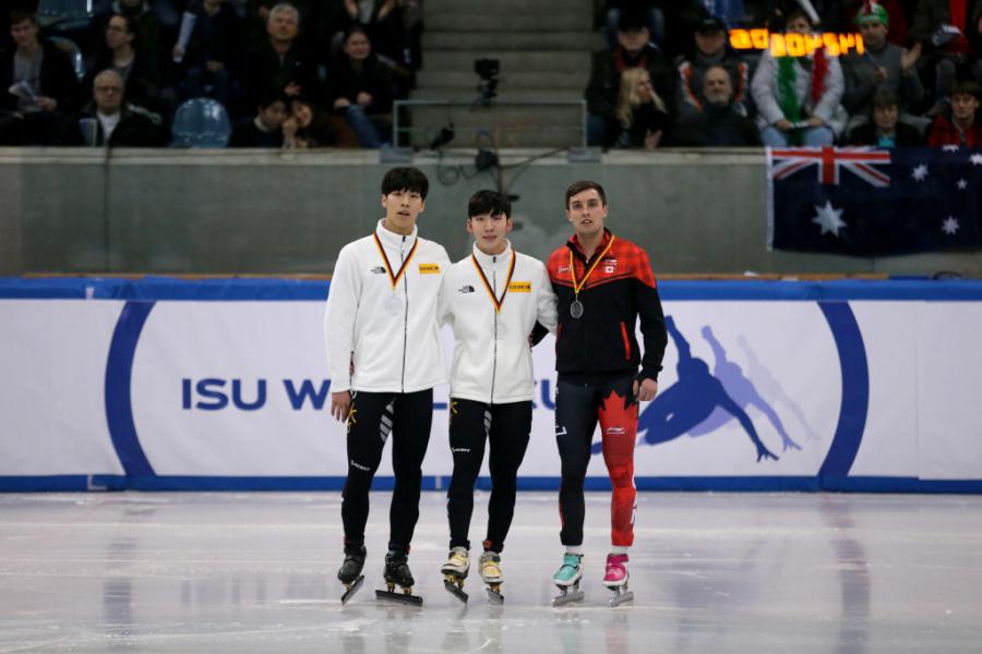 Hwang Daeheon (KOR) Lim Hyo Jun (KOR) Cedrik Blais (CAN) WCSTSS GER 2019©ISU 1127153439